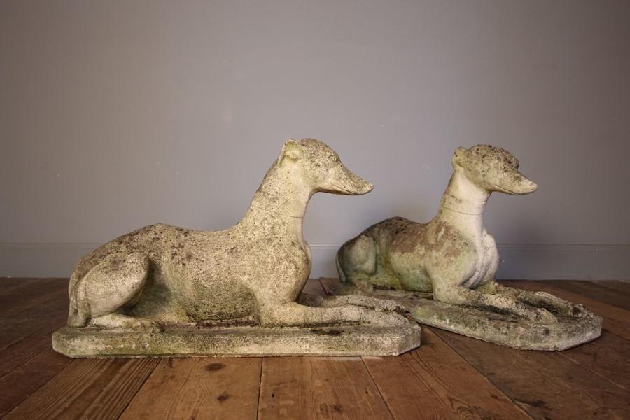 A Pair of Composite Stone Greyhounds