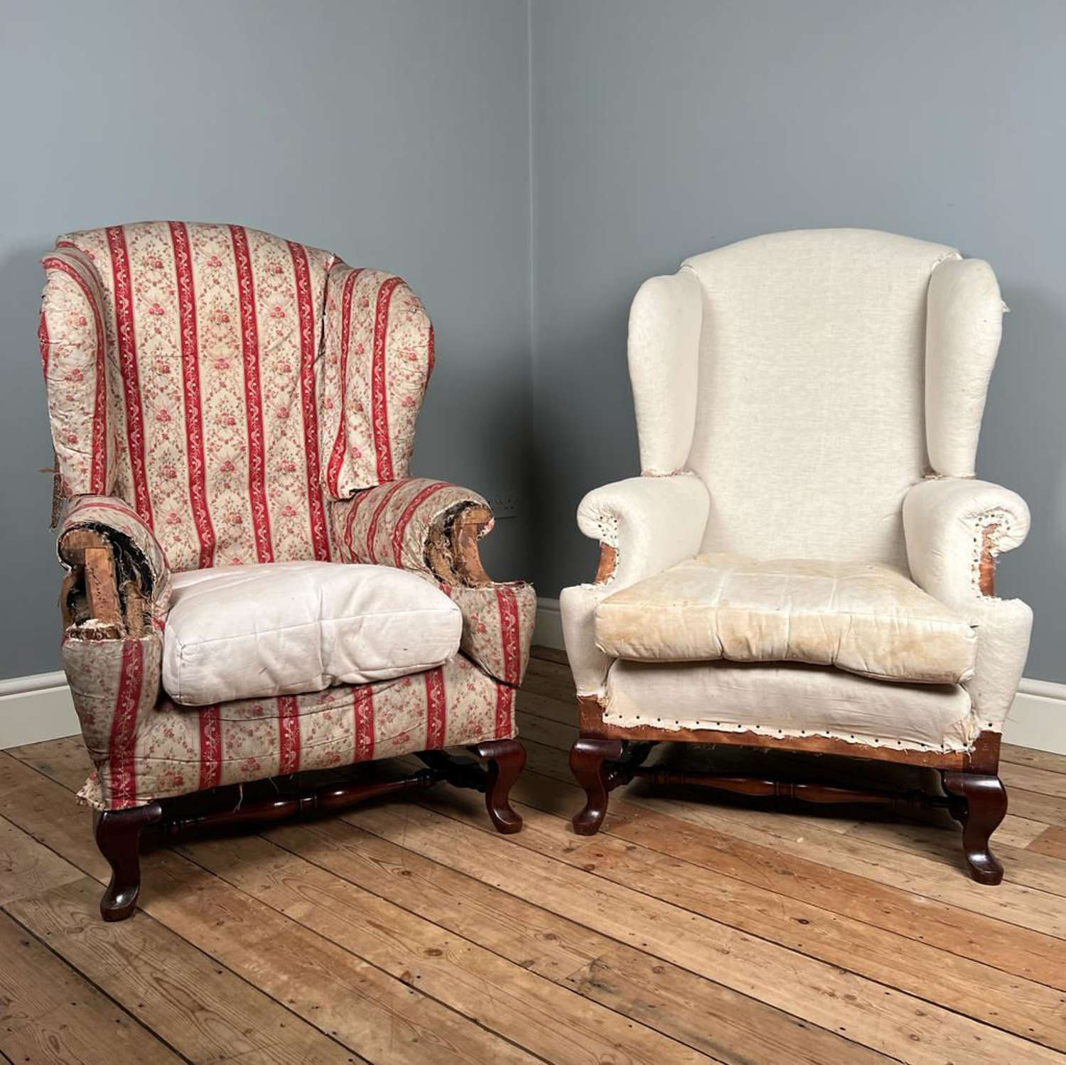A pair of Howard & Sons Ennismore Wing Chairs