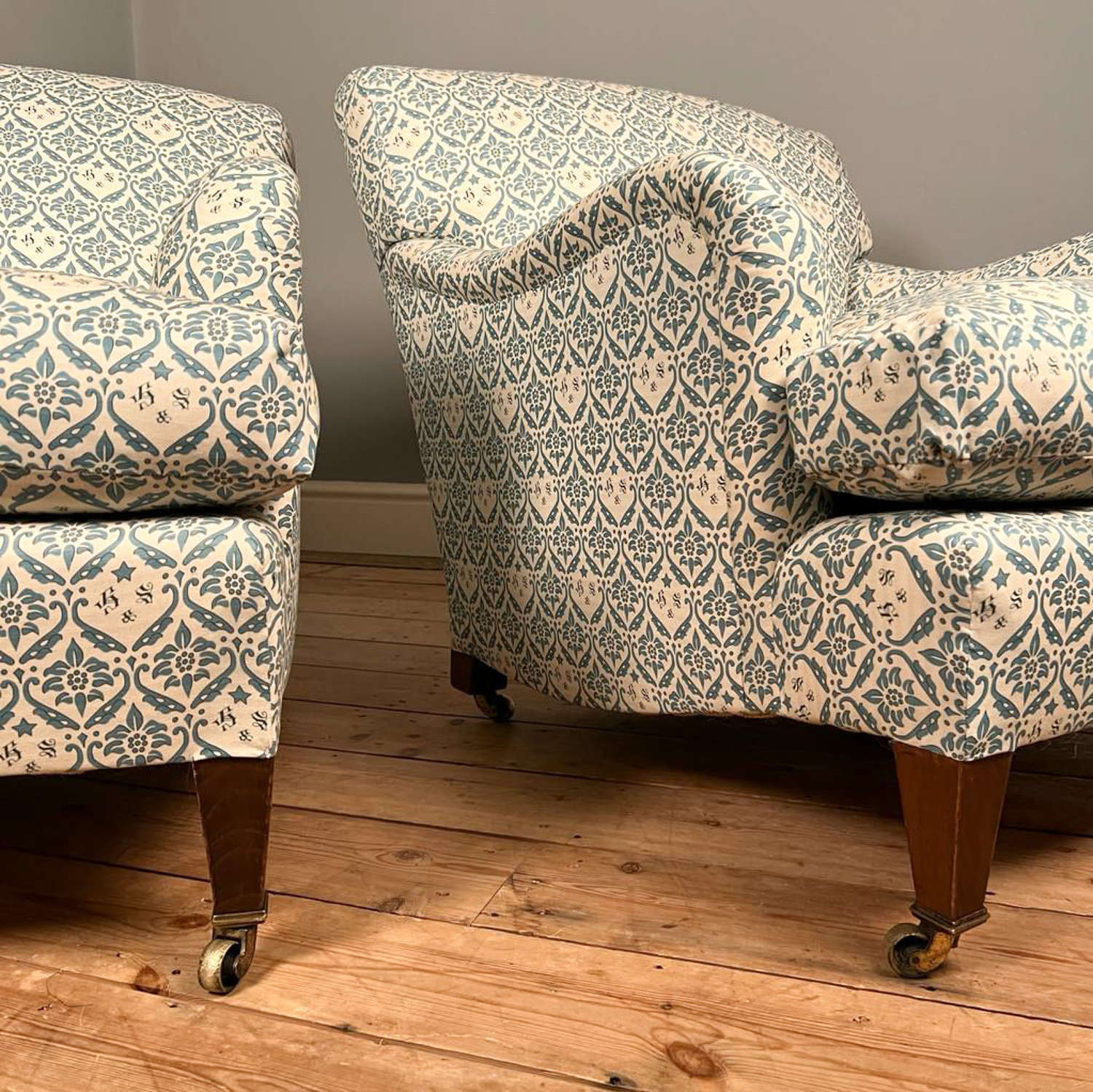 A True Pair of Howard & Sons Bridgewater Armchairs