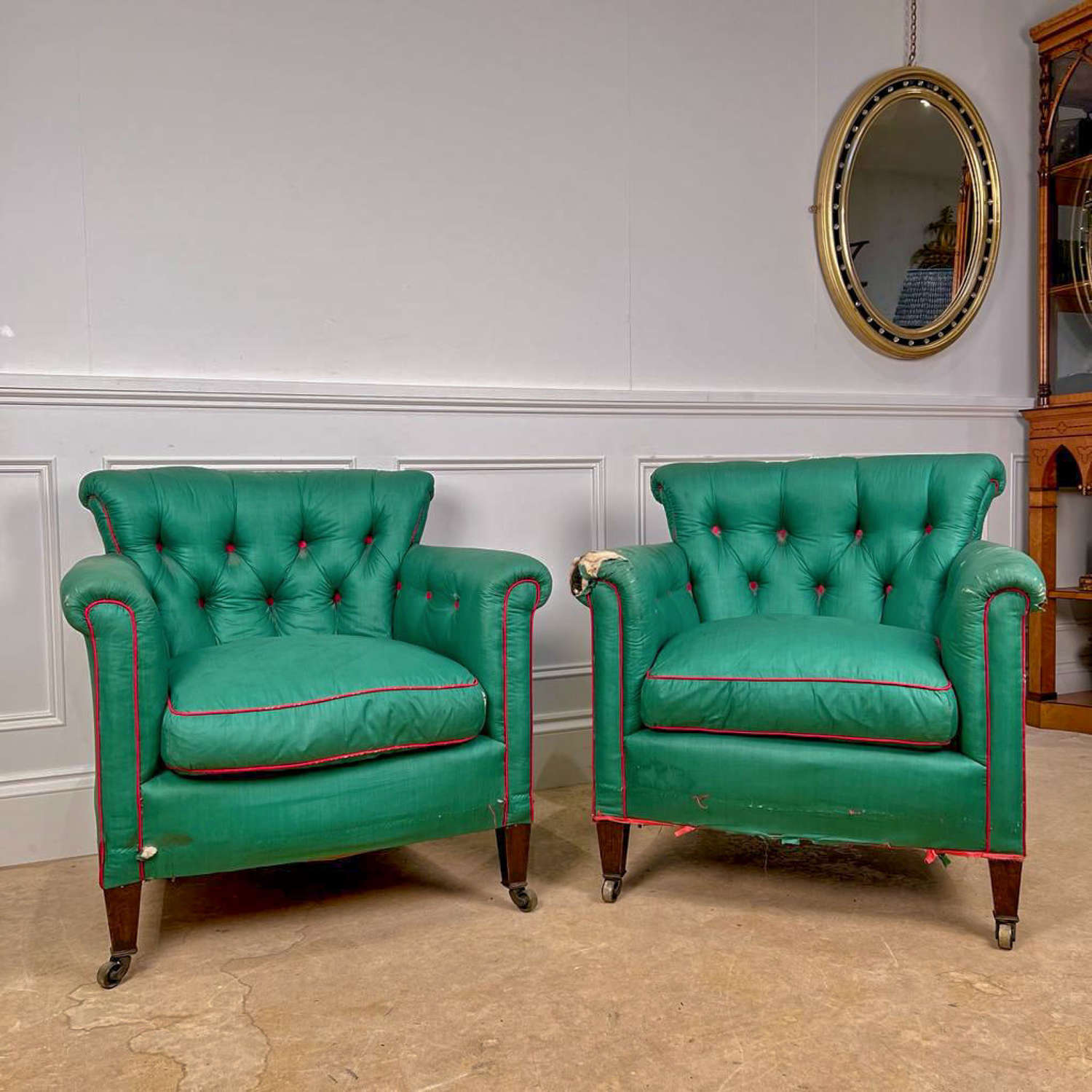 A Pair of Howard Style Woodstock Armchairs