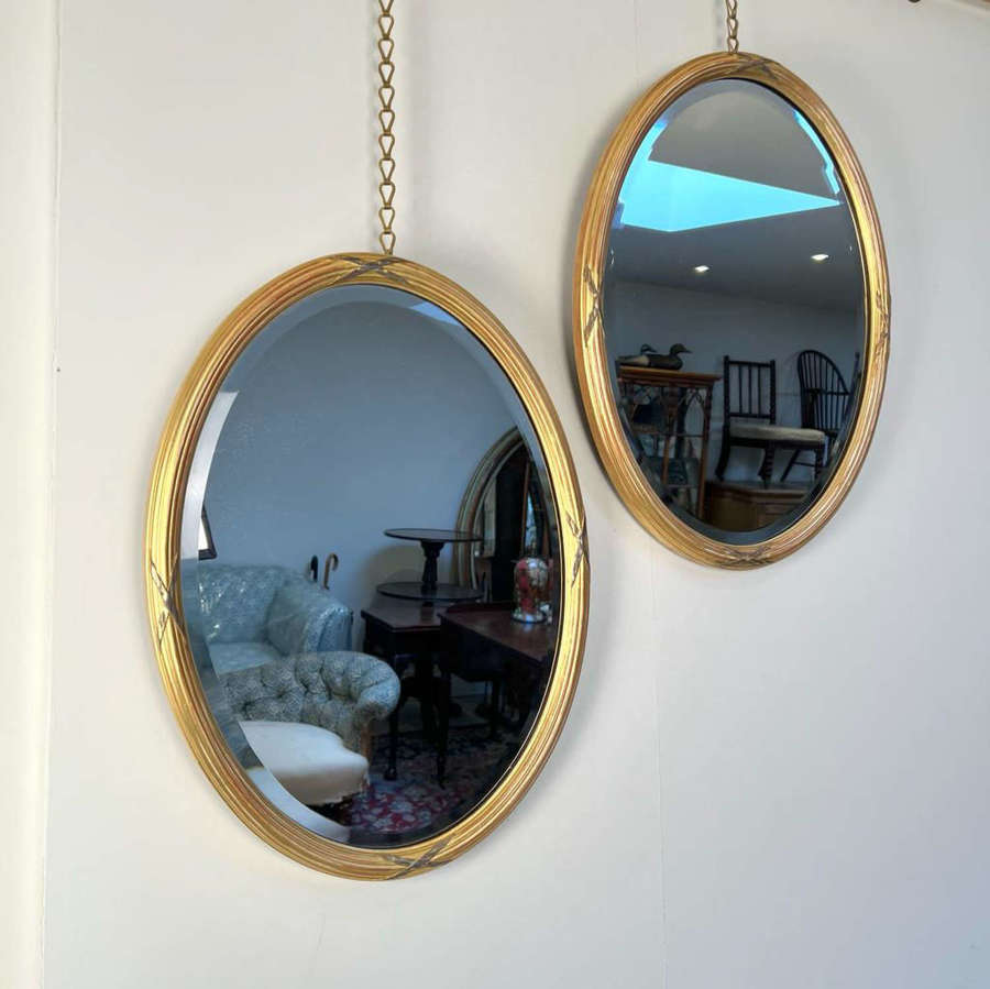 A Pair of Edwardian Giltwood Oval Mirrors In the Georgian Style