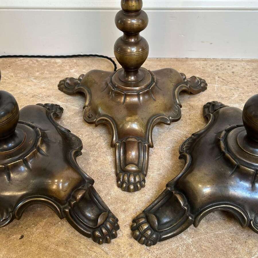 A Set of 3 Patinated Brass Floor Lamps