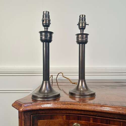 A Pair of Patinated Brass Candle Lamps